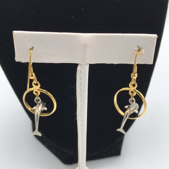 Silver tone dolphin jumping through gold tone hoop earrings - Picture 4 of 6